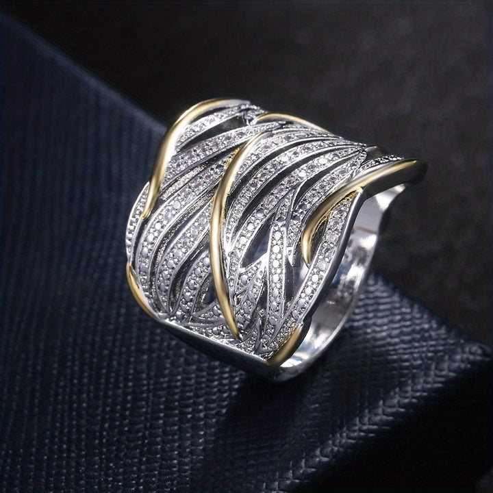 RHEA – TWISTED BAND RING